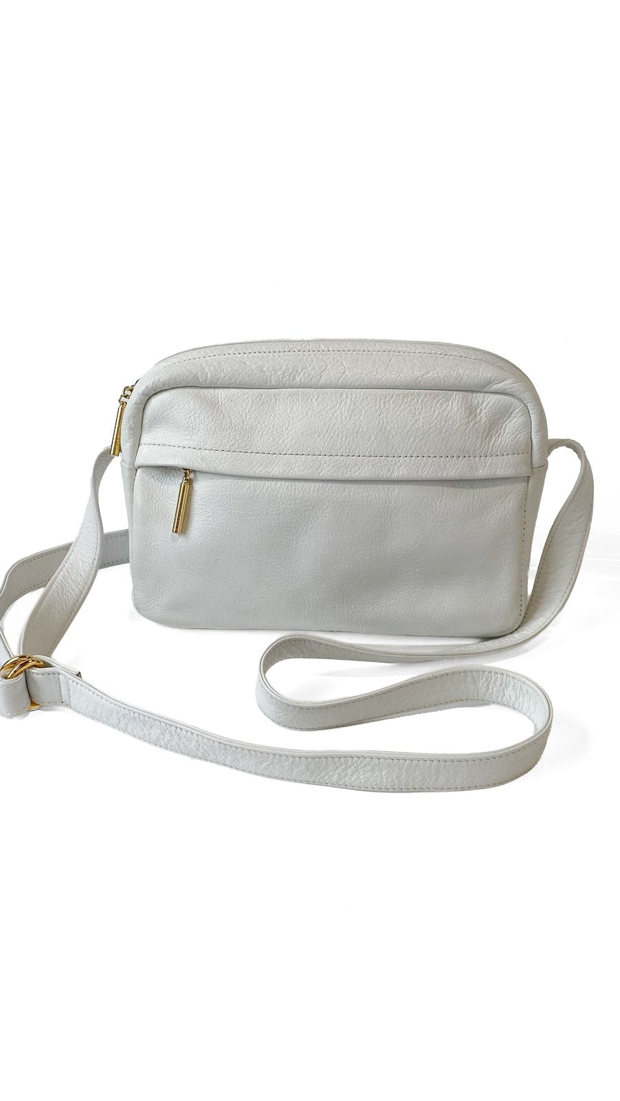A white crossbody bag with a matching adjustable strap and small gold-tone hardware, shown on a plain white background.