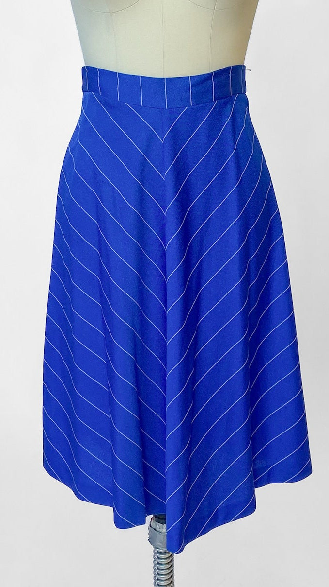 Blue skirt on a mannequin against a white background