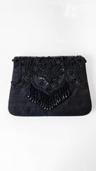 Black beaded clutch bag on a white background