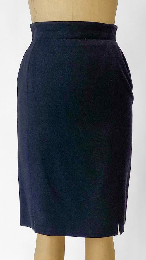 Navy blue pencil skirt on a mannequin against a white background