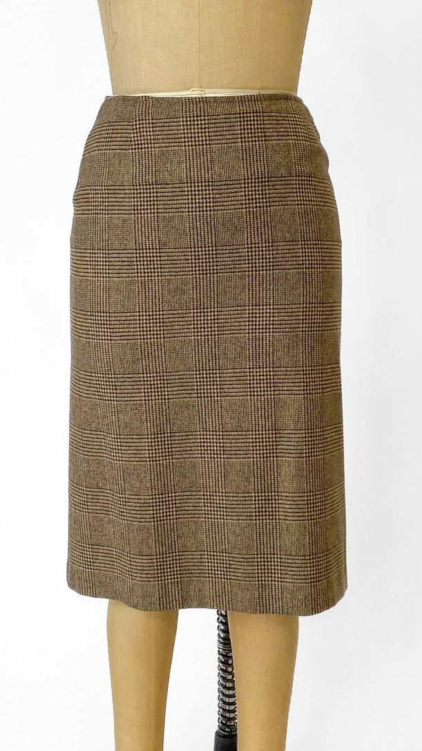 Brown checkered skirt on a mannequin against a white background
