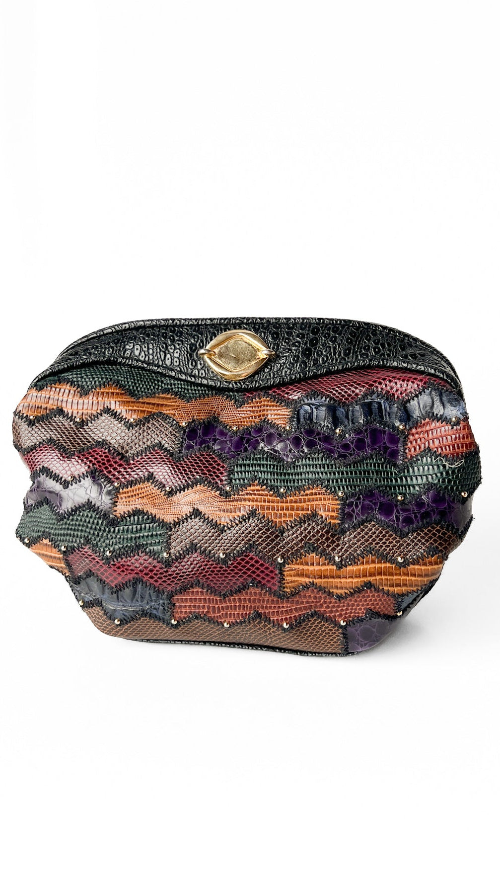 Multicolored patterned clutch bag on a white background