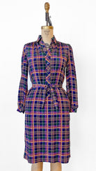 Plaid dress on a mannequin against a white background