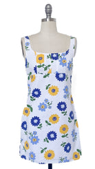 Floral-patterned dress on a mannequin against a white background