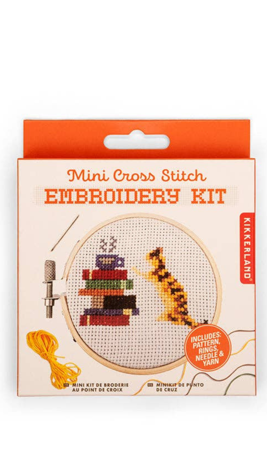  Mini Cross Stitch Embroidery Kit ifeaturing a cross-stitched cat and book design on the front.